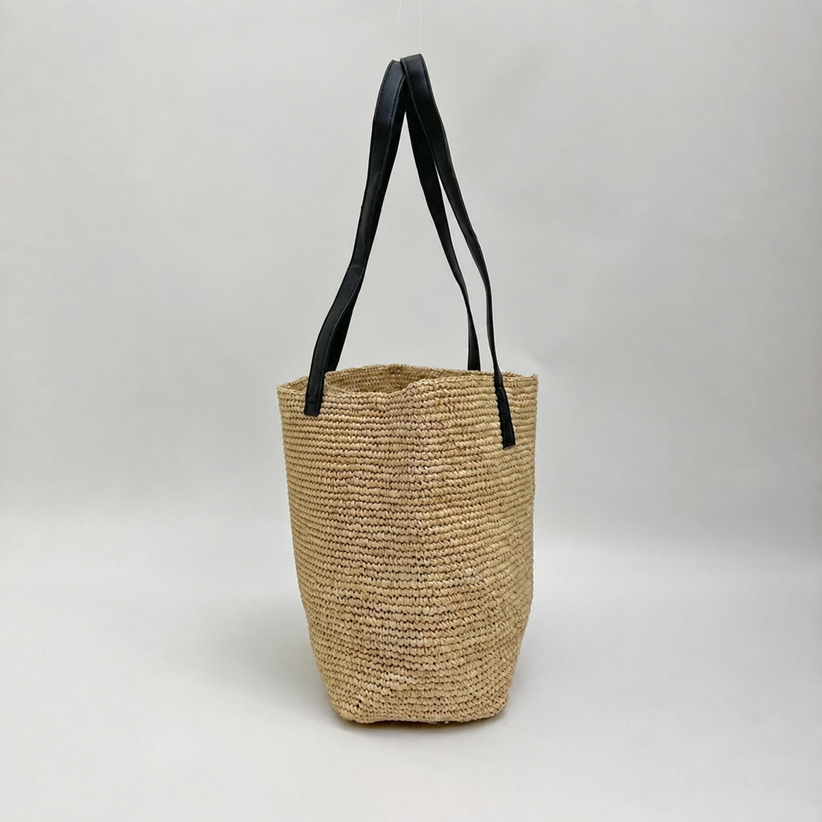 Willow Minimalist Raffia Shoulder Bag — side view of Tiger Canada handwoven raffia bag