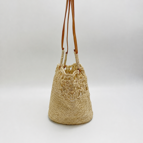 Aster Crochet Raffia Tote — side view of Tiger Canada handwoven raffia bag