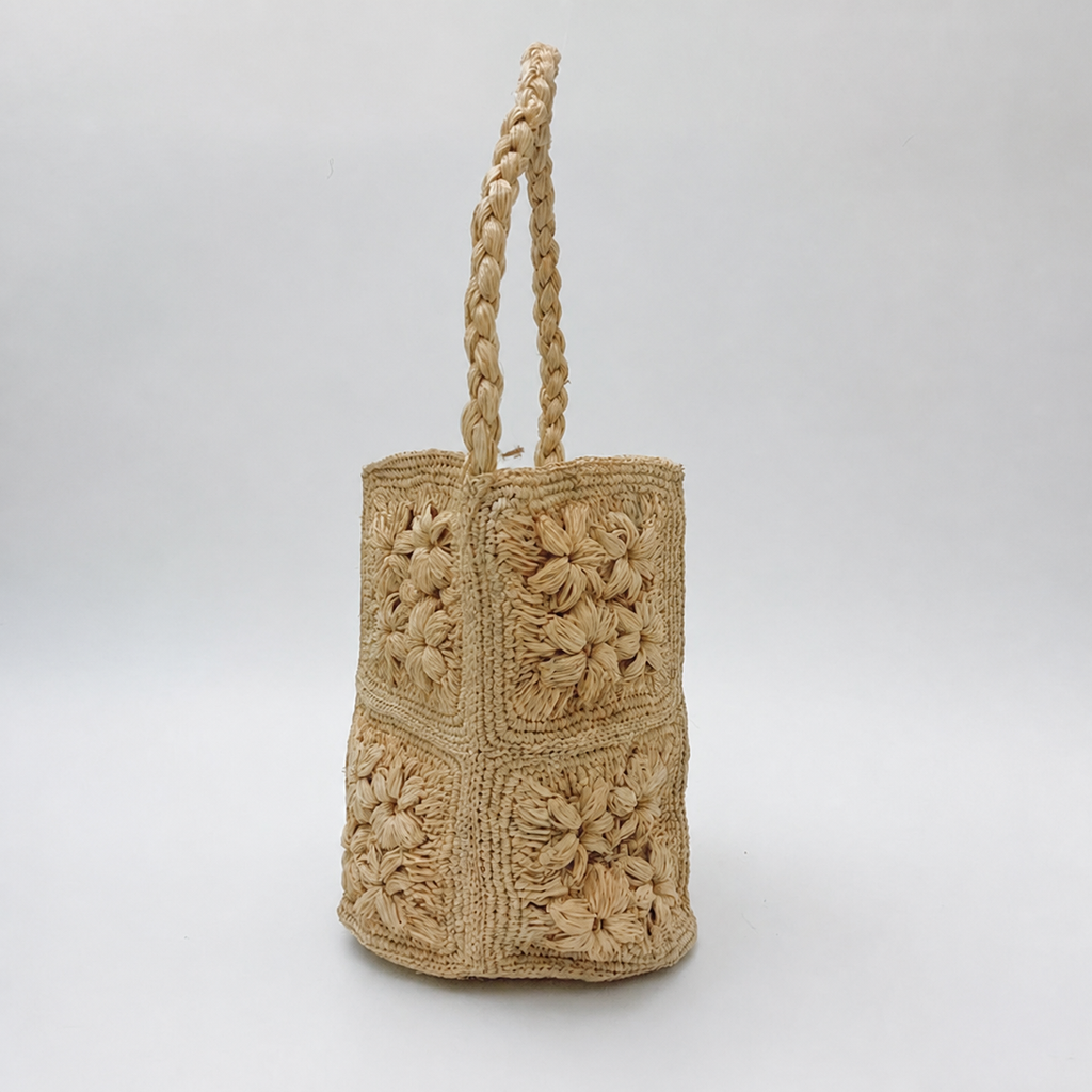 Fleur 3D Raffia Bucket Bag — side view of Tiger Canada handwoven raffia bag