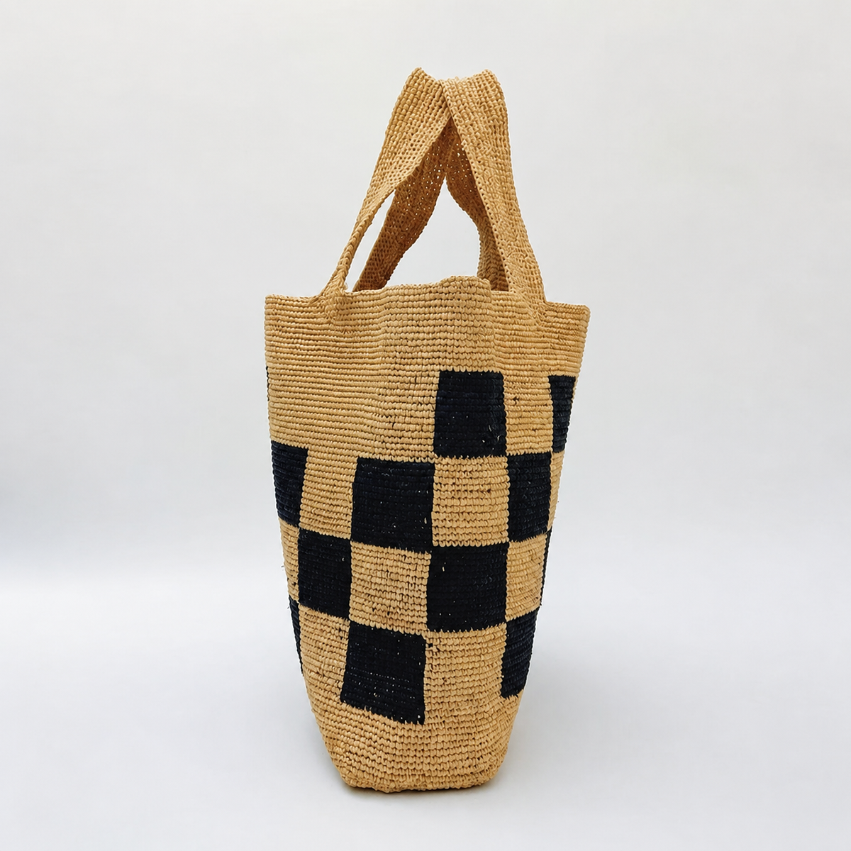 Checkmate Raffia Tote — side view of Tiger Canada handwoven raffia bag