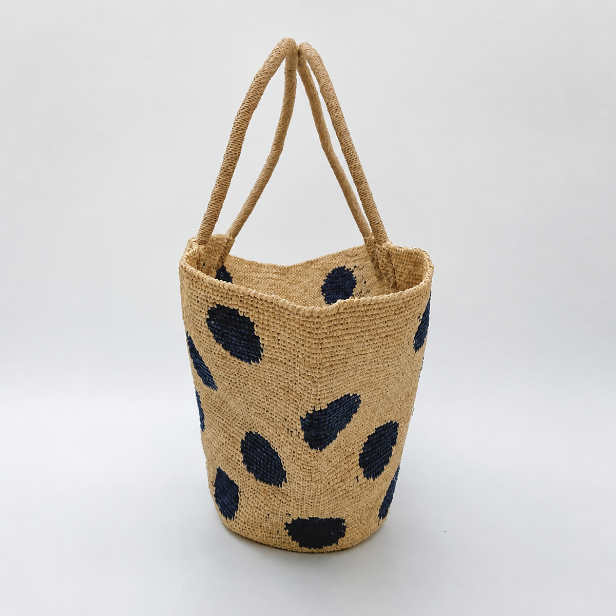 Dottie Crochet Raffia Tote — side view of Tiger Canada handwoven raffia bag