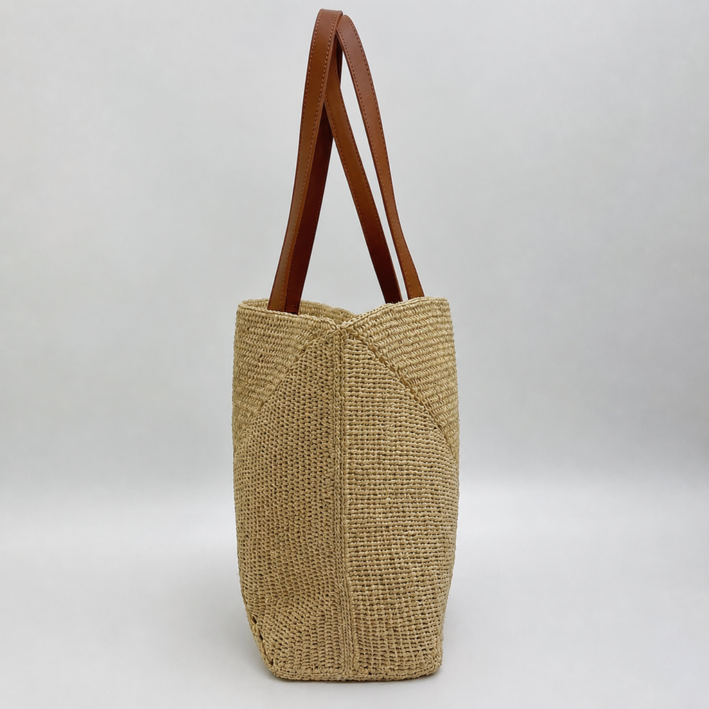 Rowan Leather-Strap Raffia Tote — side view of Tiger Canada handwoven raffia bag