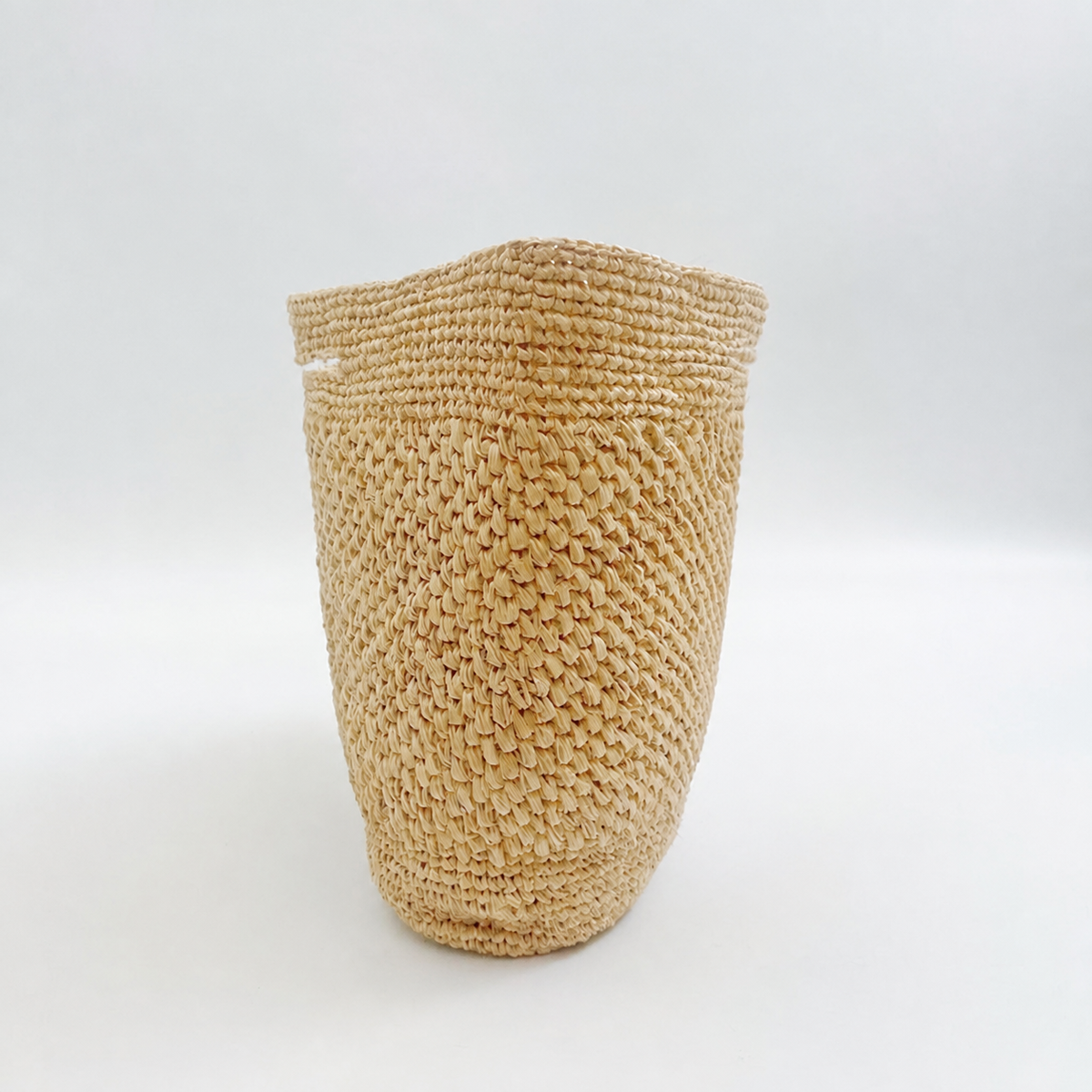 Nola Small Raffia Tote — side view of Tiger Canada handwoven raffia bag