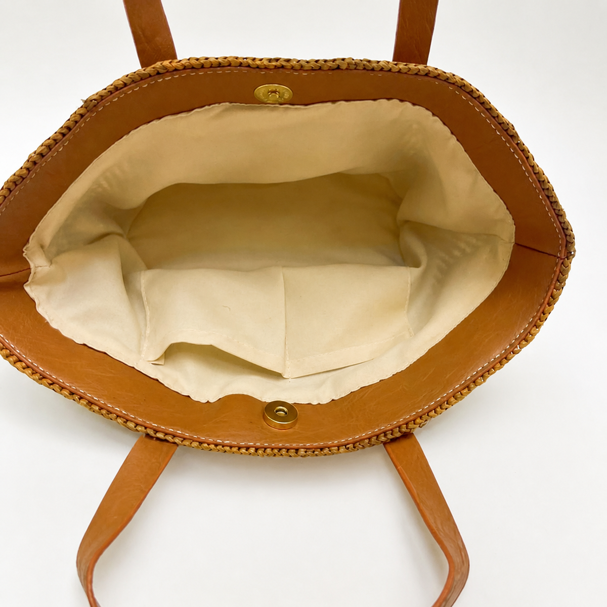 Cove Mini Raffia Tote — interior and construction detail of Tiger Canada handwoven raffia bag