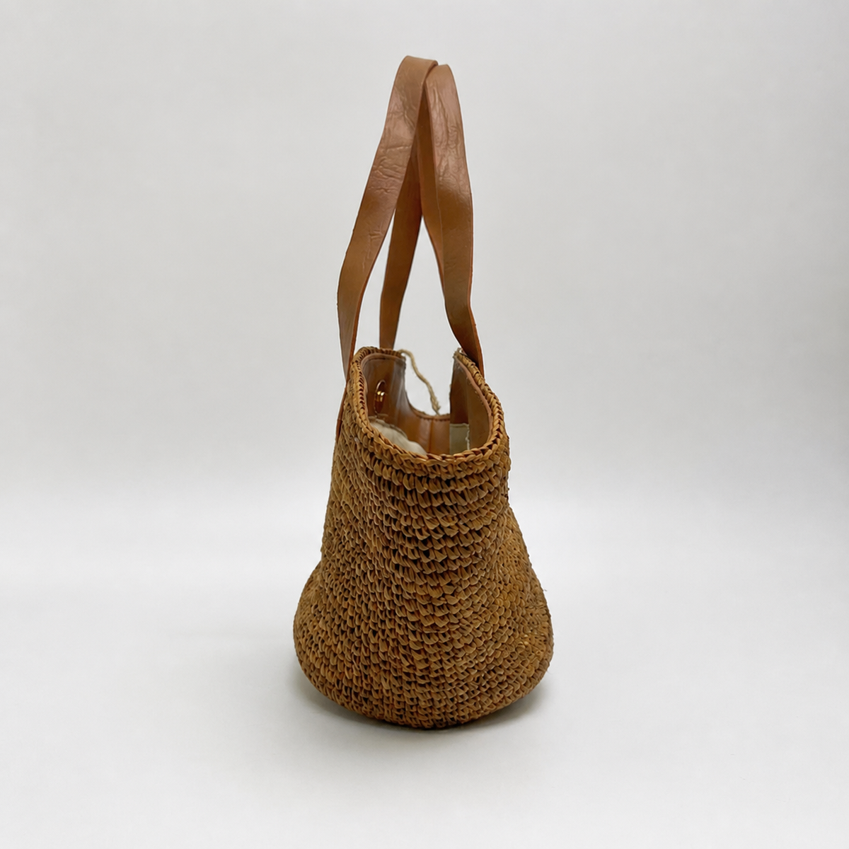Cove Mini Raffia Tote — side view of Tiger Canada handwoven raffia bag