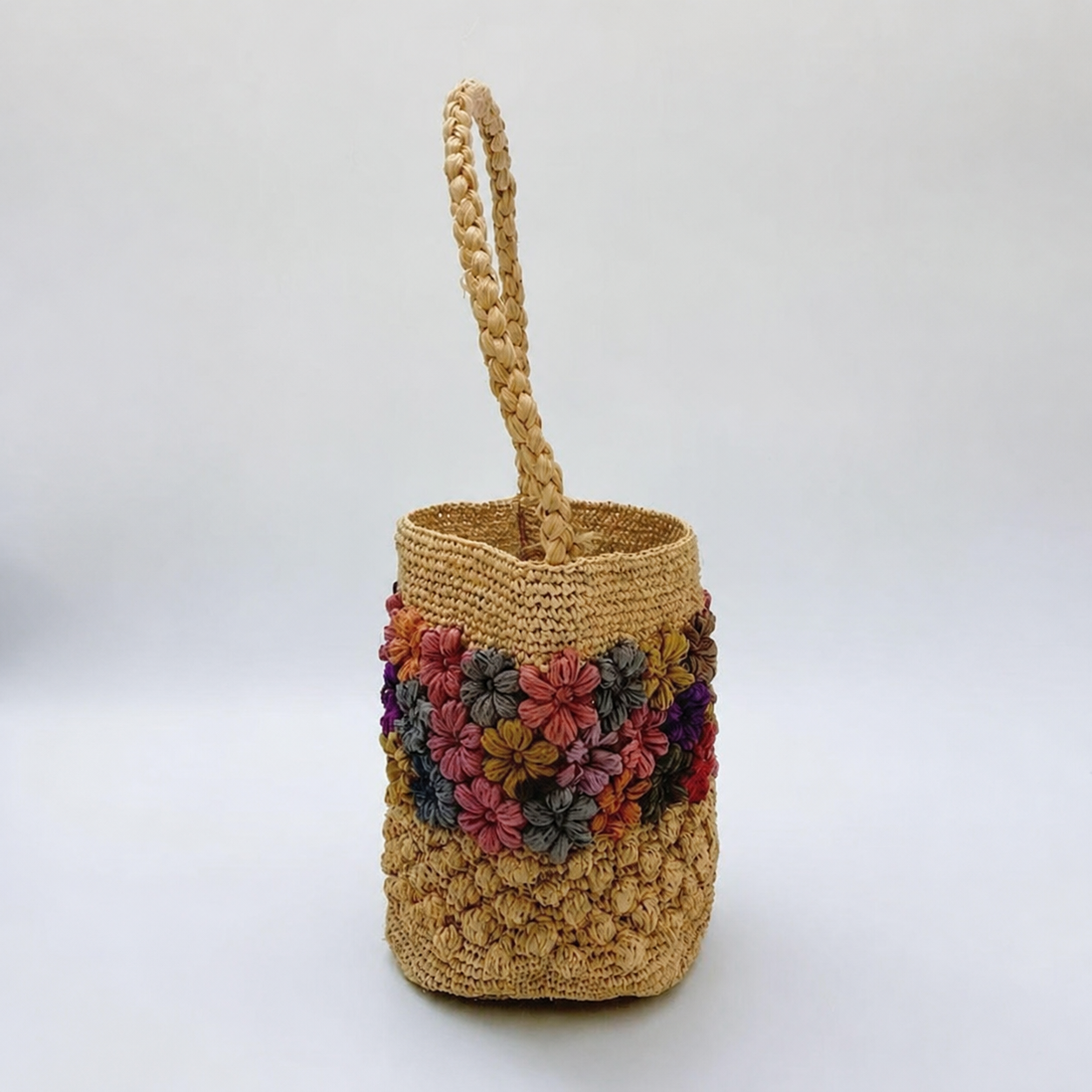 Petal Crochet Raffia Bucket Bag — side view of Tiger Canada handwoven raffia bag