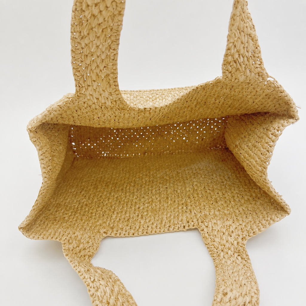 Haven Minimalist Woven Tote — interior and construction detail of Tiger Canada handwoven raffia bag