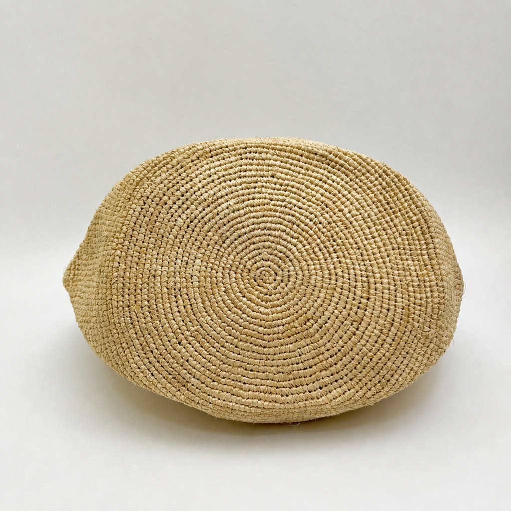 Mercer Large Leather-Strap Raffia Tote — interior and construction detail of Tiger Canada handwoven raffia bag