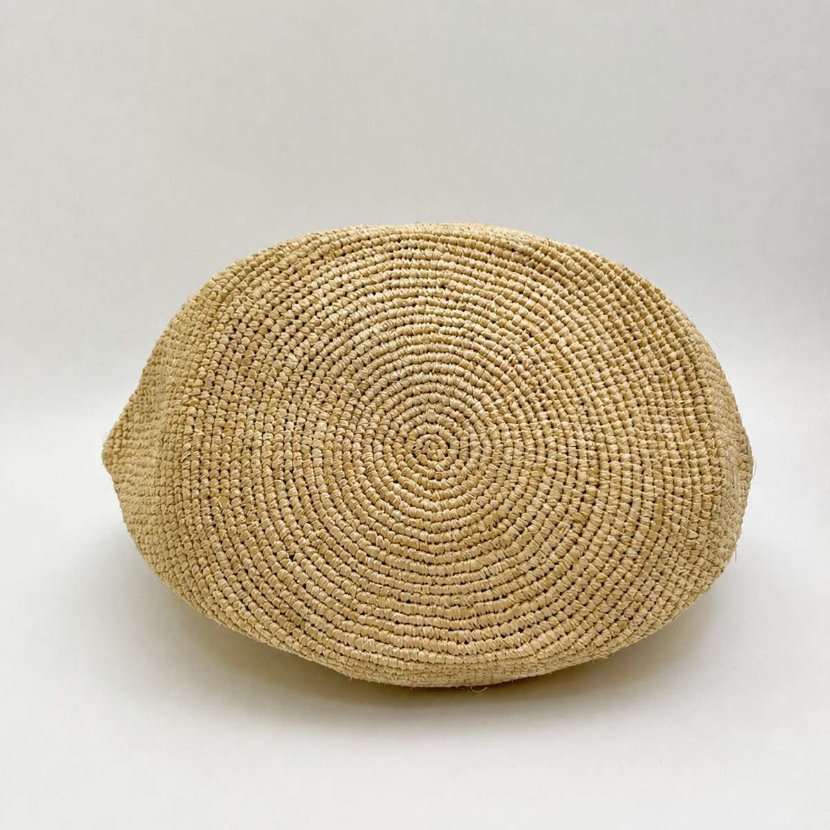 Mercer Large Leather-Strap Raffia Tote — interior and construction detail of Tiger Canada handwoven raffia bag