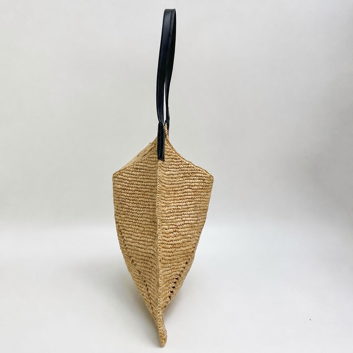 Trielle Raffia Shoulder Bag — side view of Tiger Canada handwoven raffia bag