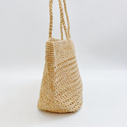 Airlight Hollow Raffia Tote — side view of Tiger Canada handwoven raffia bag