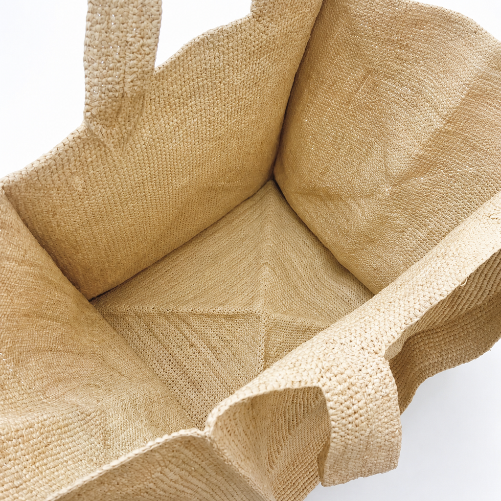 Meadow Minimalist Raffia Tote — interior and construction detail of Tiger Canada handwoven raffia bag