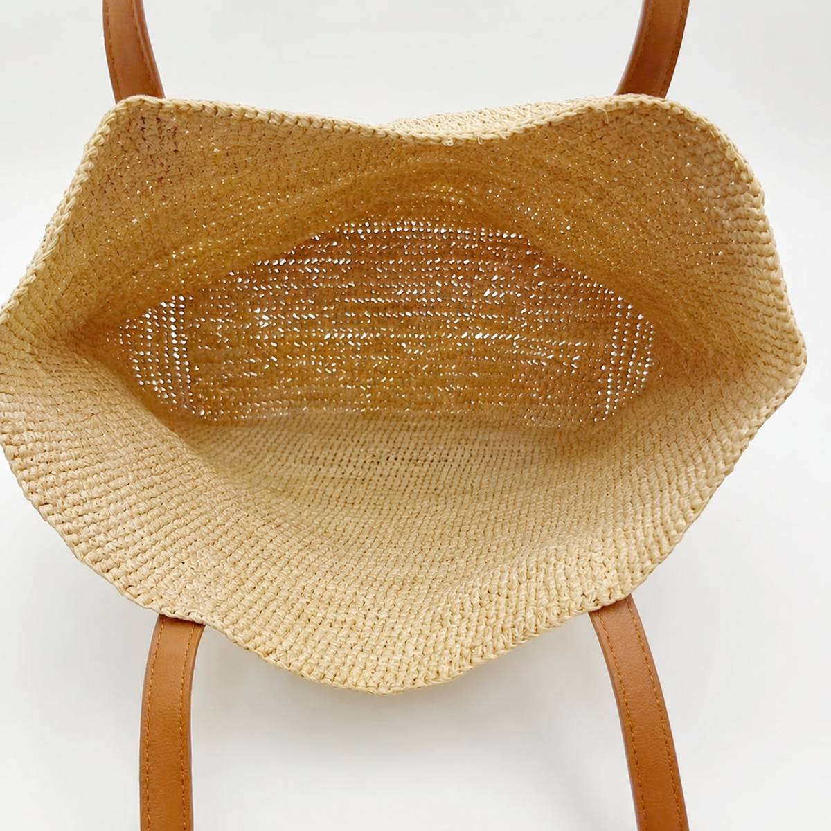Wren Large Leather-Strap Raffia Tote — interior and construction detail of Tiger Canada handwoven raffia bag