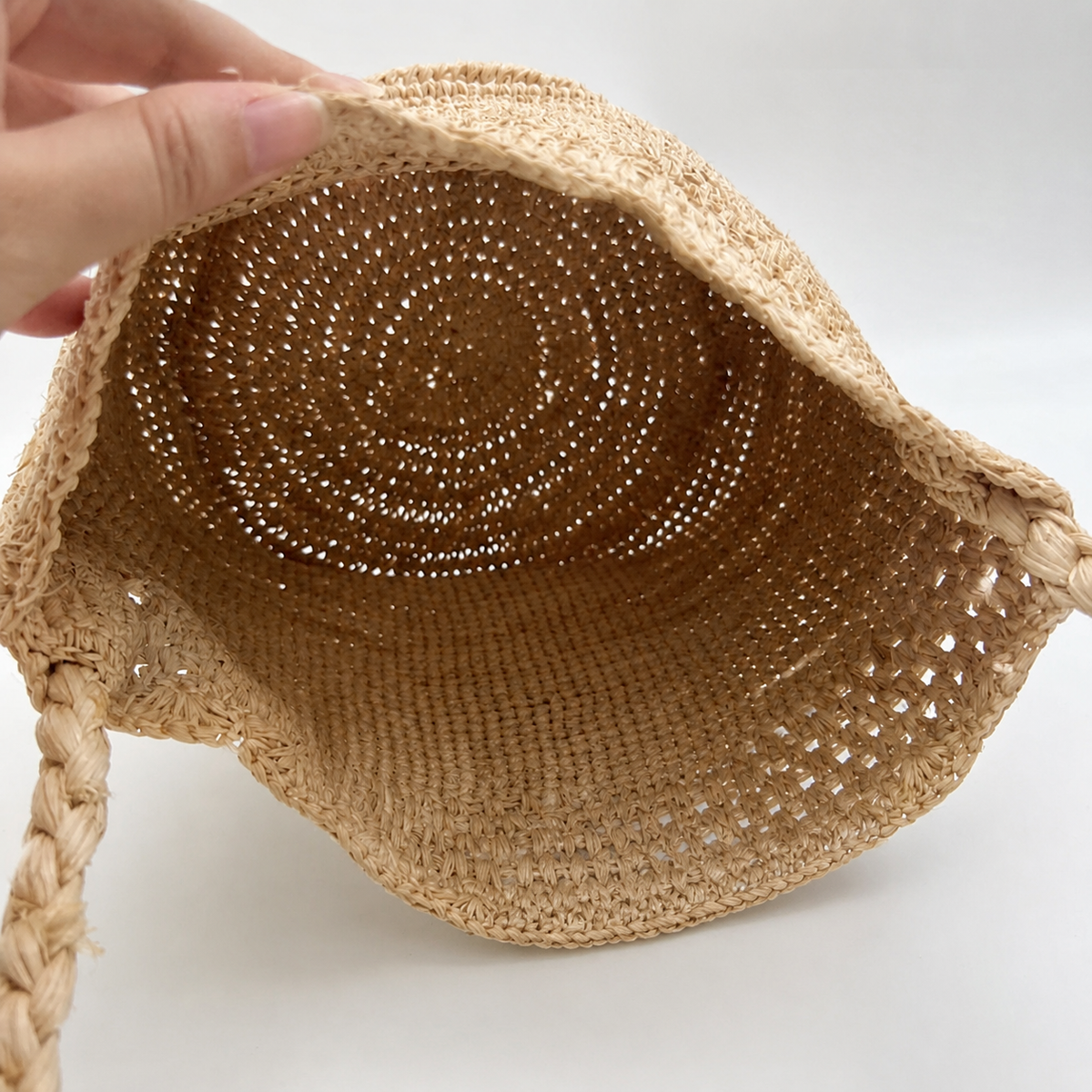 Belle Raffia Bucket Bag — interior and construction detail of Tiger Canada handwoven raffia bag
