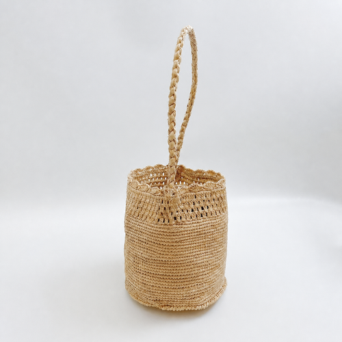 Belle Raffia Bucket Bag — side view of Tiger Canada handwoven raffia bag