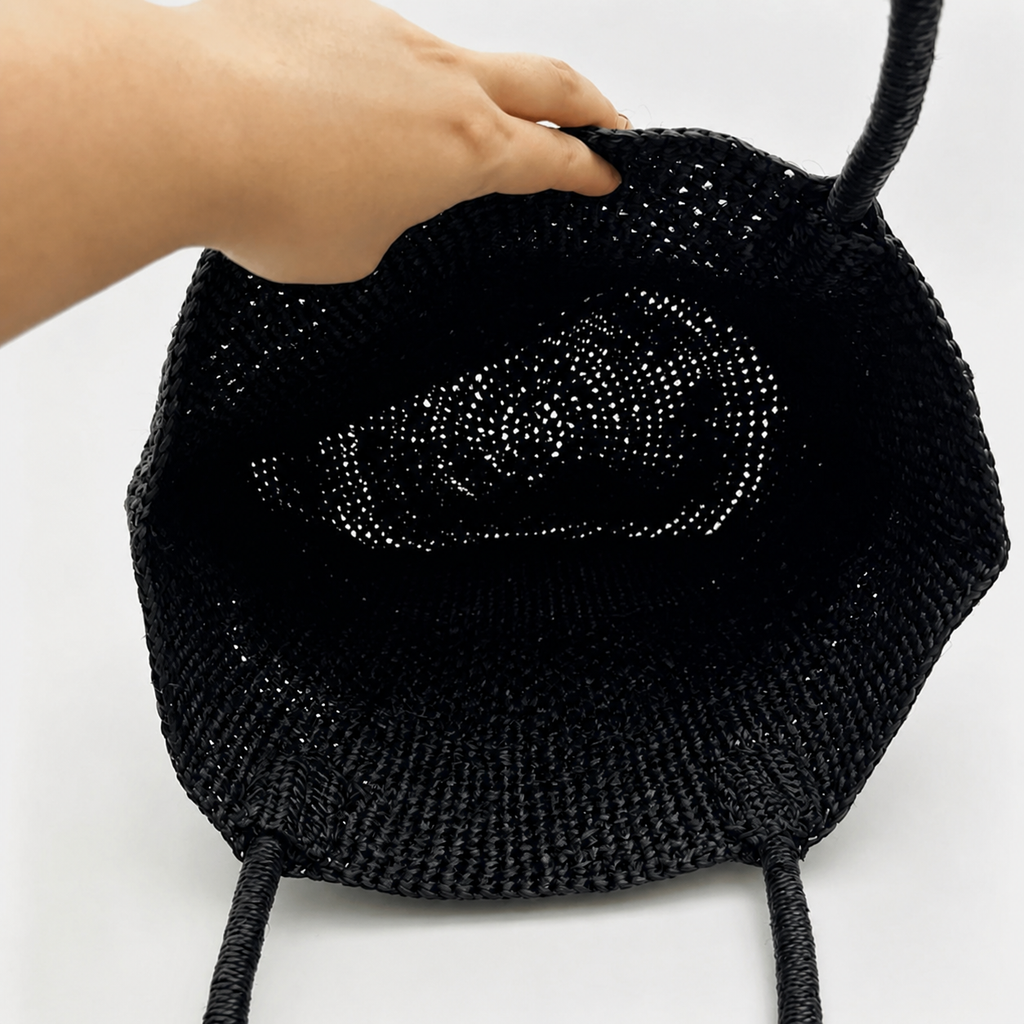 Luna Slouchy Crochet Raffia Tote — interior and construction detail of Tiger Canada handwoven raffia bag
