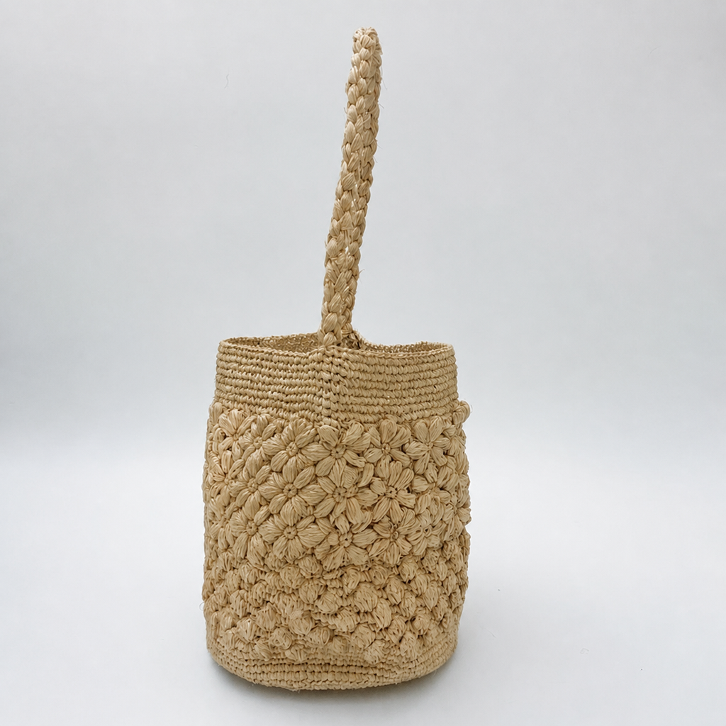 Bloom Crochet Raffia Bucket Bag — side view of Tiger Canada handwoven raffia bag