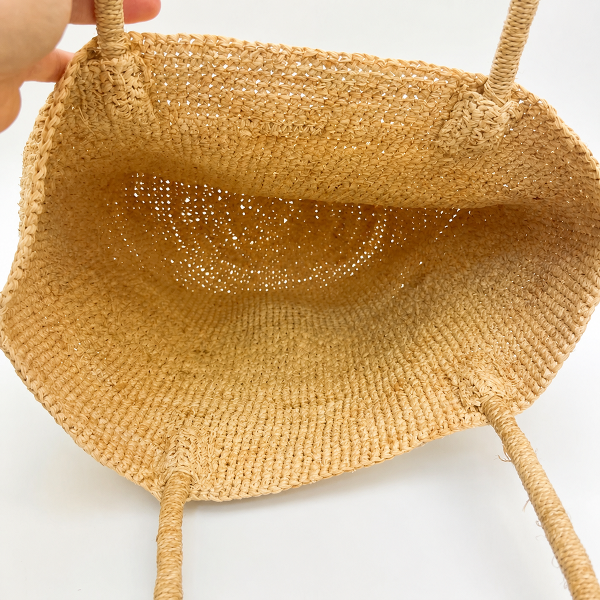 Terra Natural Raffia Tote — interior and construction detail of Tiger Canada handwoven raffia bag